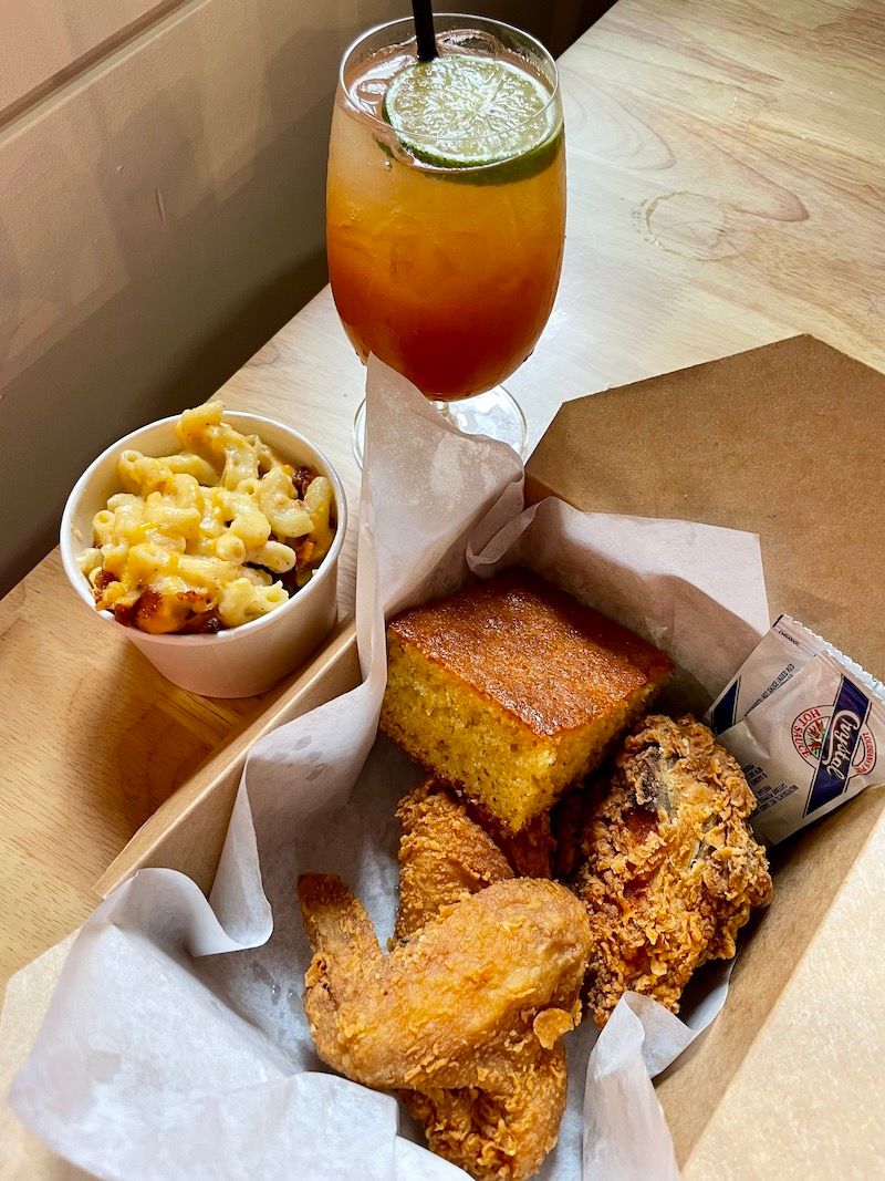 fried chicken, mac and cheese, and cornbread from Minnie Bell’s during a pop-up at La Cocina Municipal Marketplace