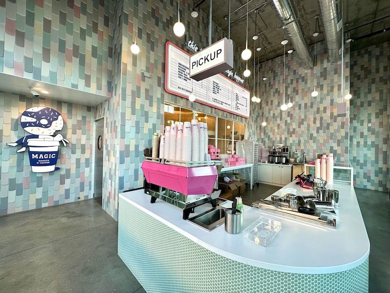 Magic Donuts & Coffee counter and pink espresso machine