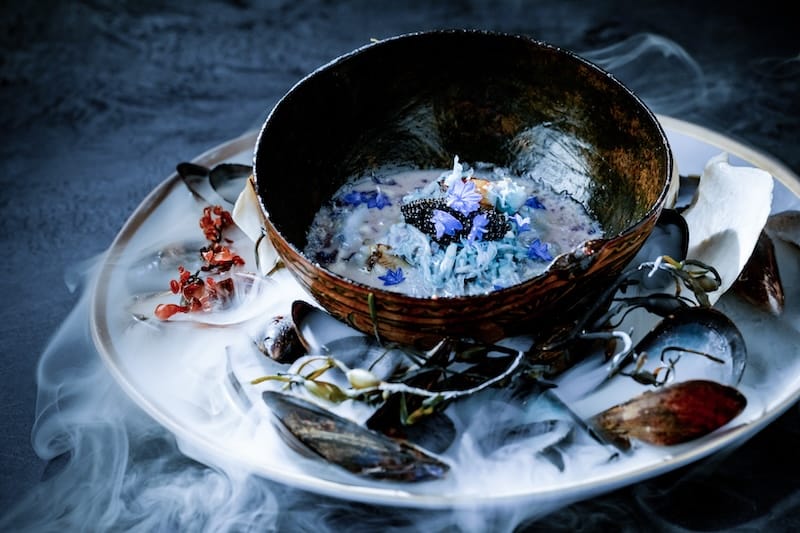 A blue dish from Merchant Roots’ upcoming Color Theory theme. Photo courtesy of Merchant Roots.