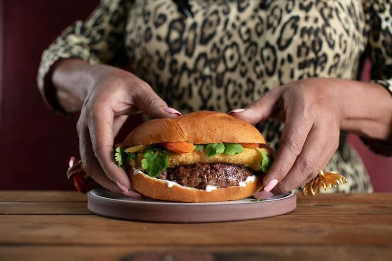 Get ready to sink your choppers into a MOREburger. Photo courtesy of Merkado.