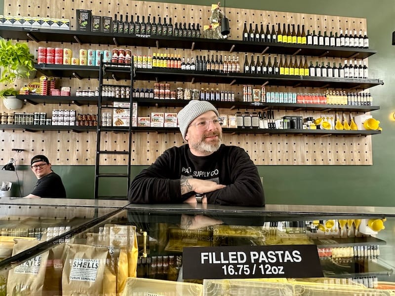 Chef-owner Anthony Strong behind the counter of the new Pasta Supply Co. Mission. Photo: © tablehopper.com.