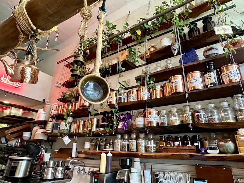 The many treasures on the shelves of Beloved Cafe. Photo: © tablehopper.com.