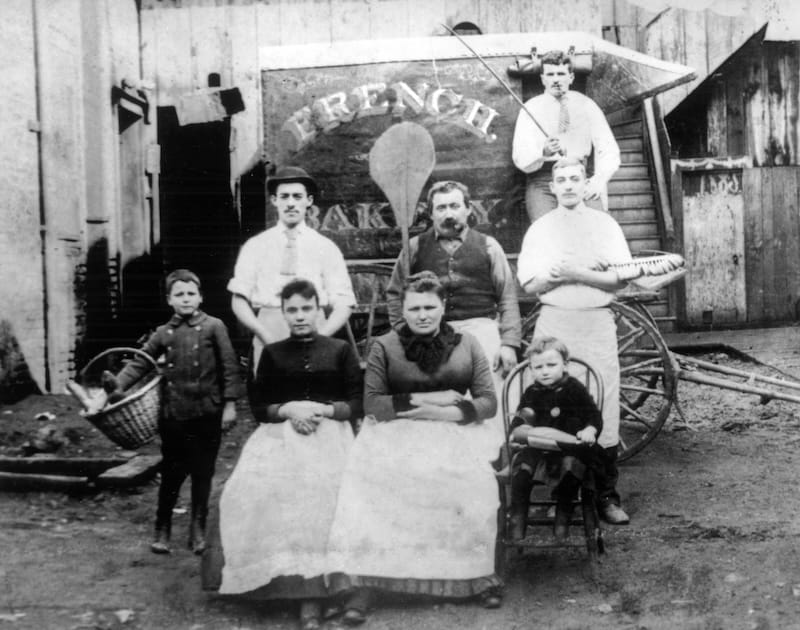 The Boudin family: master baker Isidore Boudin (holding the bread peel) and his wife, Louise (center), with their four children and workers in front of their bread wagon, circa 1880. Photo courtesy of Boudin Bakery.