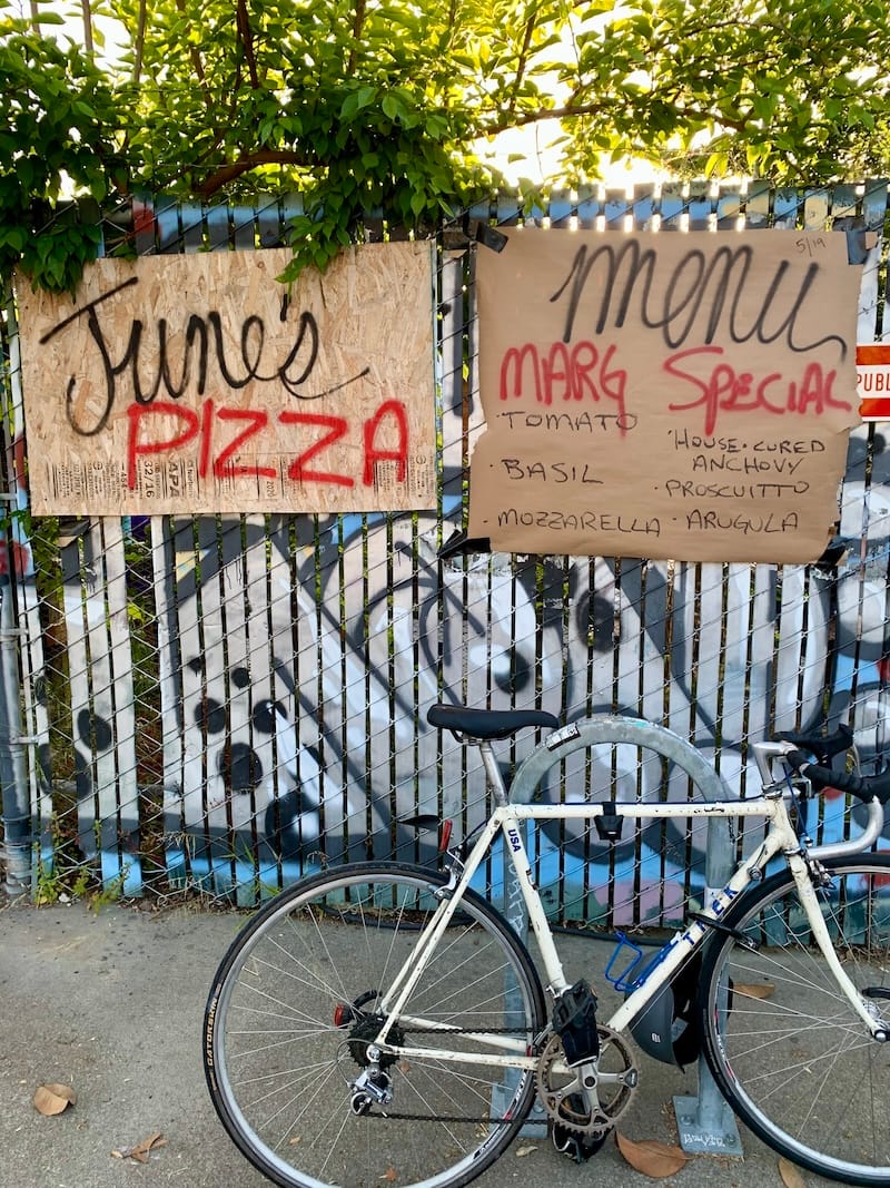 The menu board at the former June’s Pizza. Photo: © tablehopper.com.