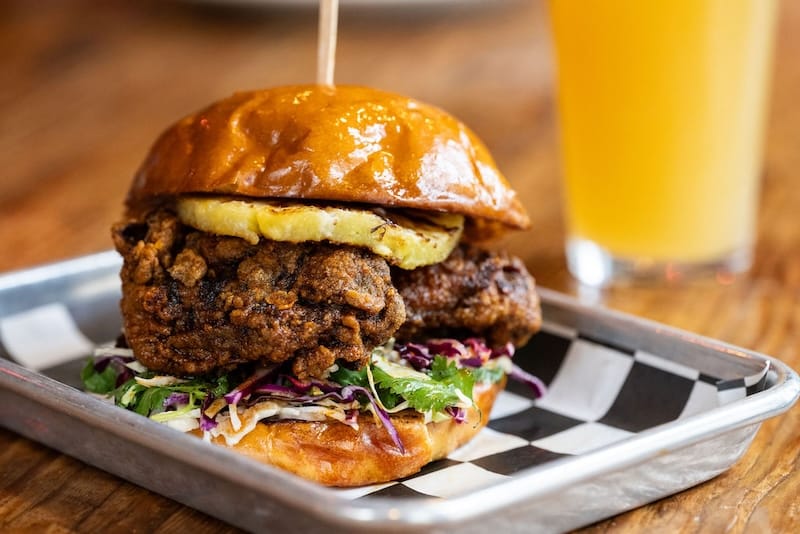 The new jerk fried chicken sandwich at Palm House. Photo courtesy of Palm House.