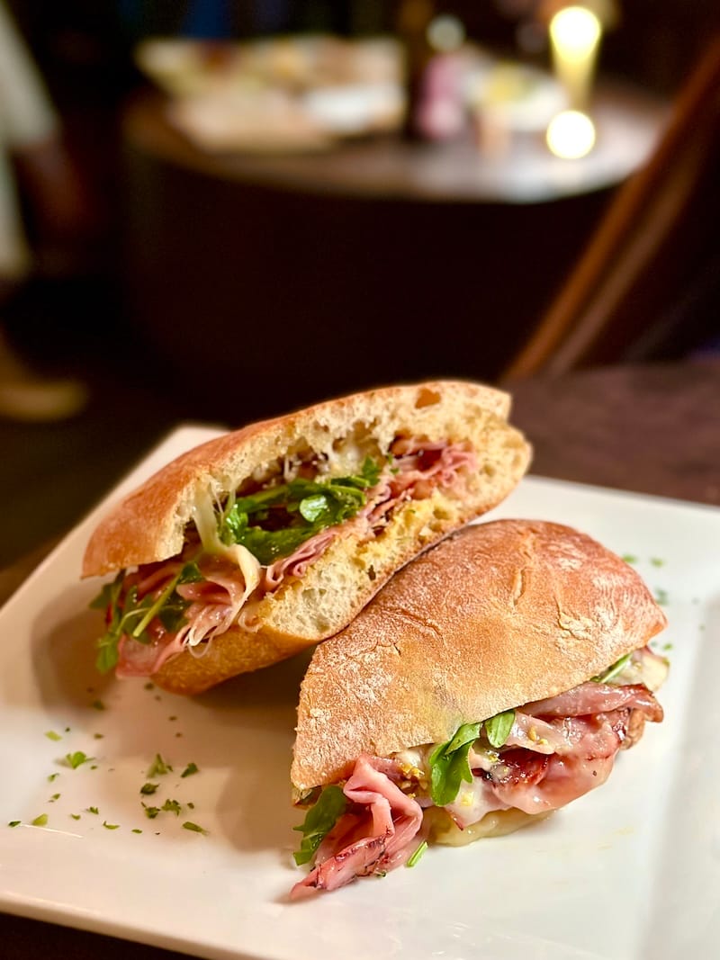 The fried mortadella panino at Unwine’d (mortadella, mozzarella, pistachio, Dijon mustard, arugula), occasionally available as a special or secret menu item. Photo: © tablehopper.com.