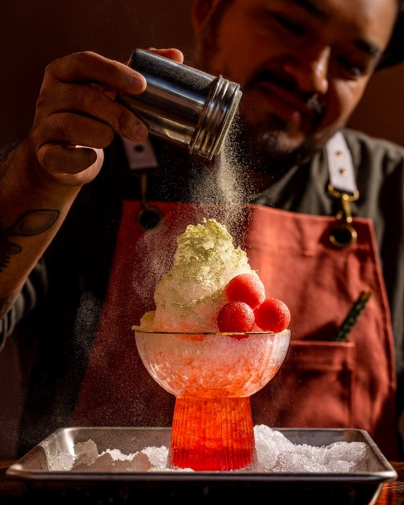 The Watermelon Crayon kakigori cocktail (low-proof white rum, watermelon cordial, rosehip, vermouth, calamansi, vanilla, mint powder, garnished with housemade watermelon rind sour candies). Photo: Nicola Parisi.