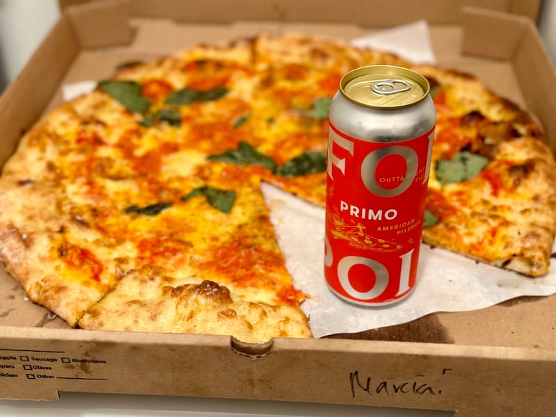 Mandatory moving food: pizza delivery. The upgrade: Primo pilsner from Fort Point Beer paired with an Outta Sight vodka pie. Photo: © tablehopper.com.