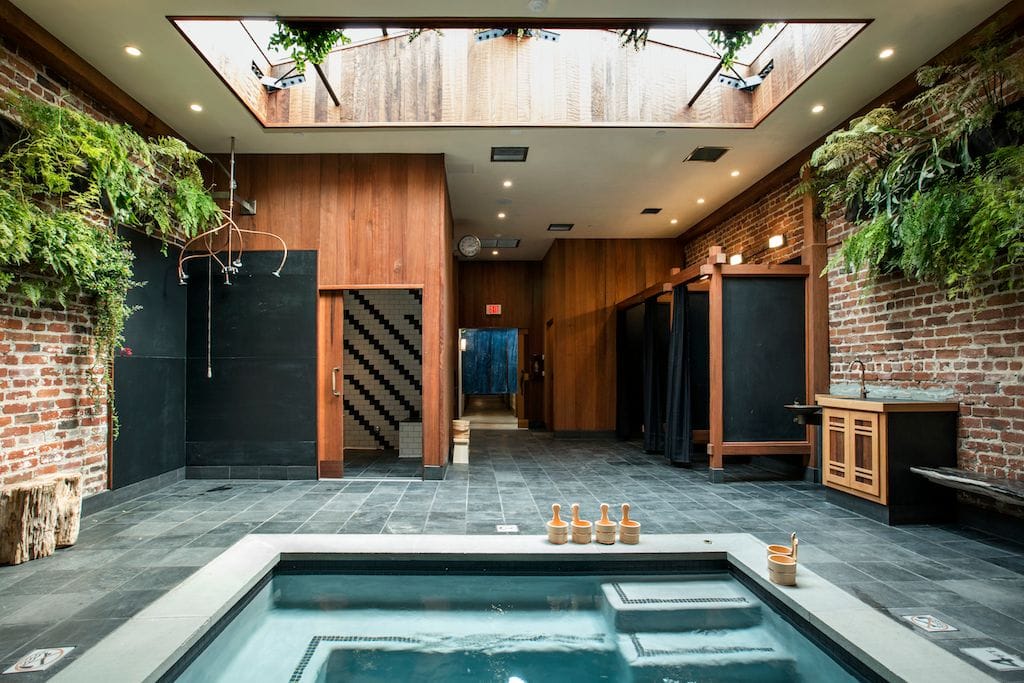 The soaking room at Onsen, with a cold plunge shower. Photo: Raquel Venancio Photography.