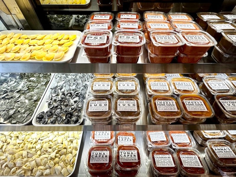 Decisions, decisions. The extensive pasta and sauce case at Pasta Supply Co. is now at your fingertips. Photo: © tablehopper.com.