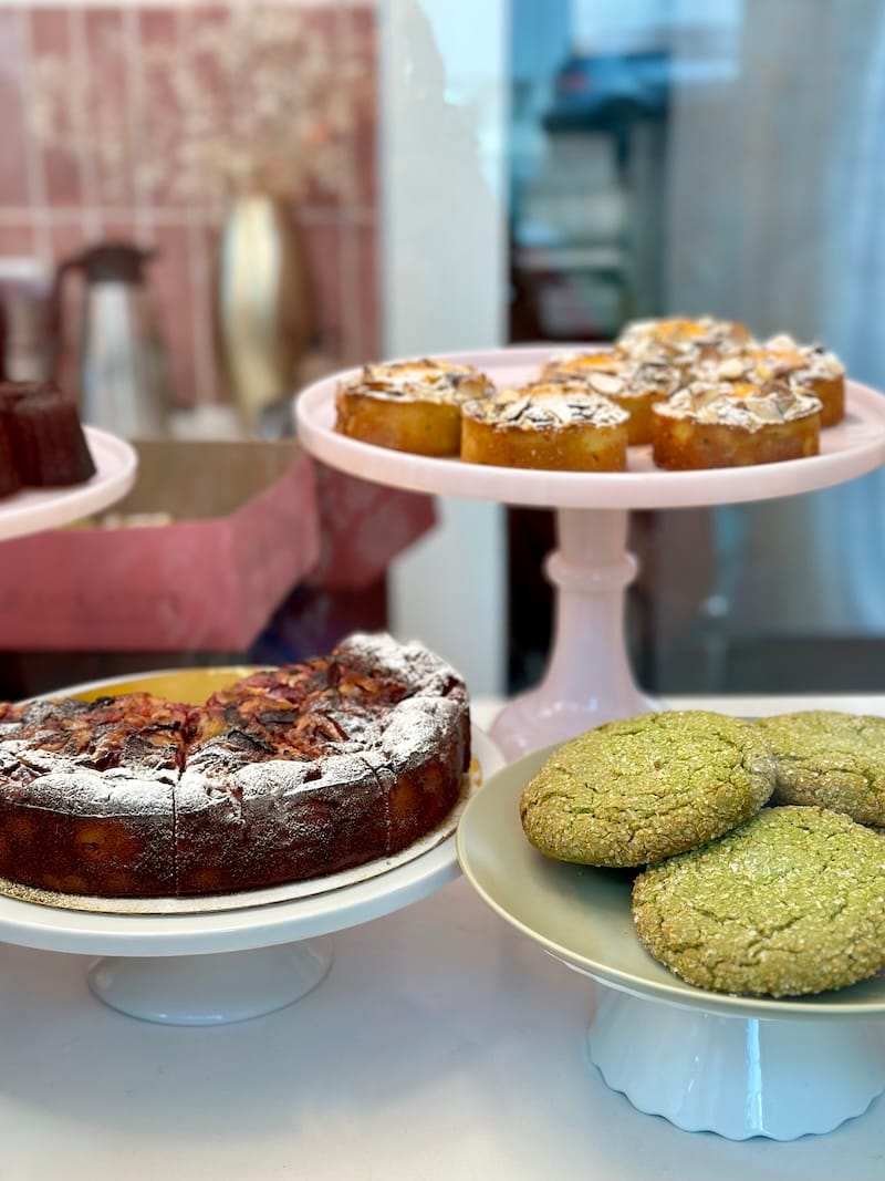 Plum yogurt cake, almond tart with passionfruit crème, matcha coconut cookies. Photo: © tablehopper.com.