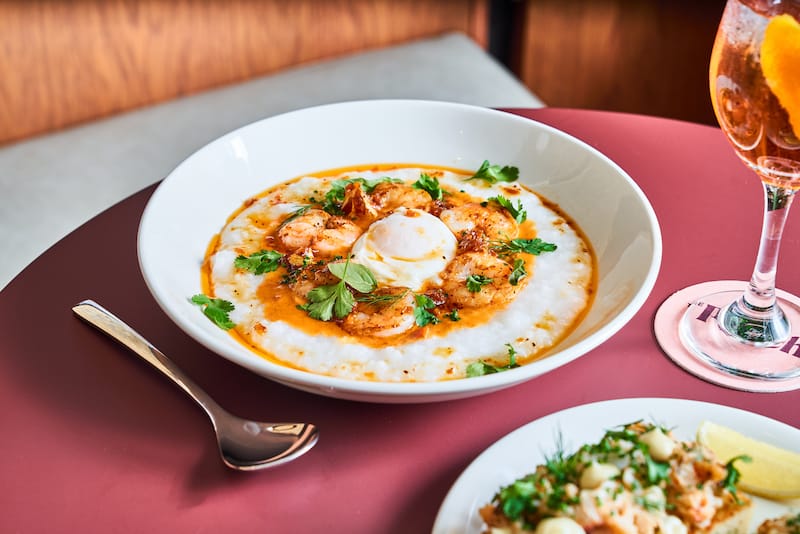 Shrimp and congee is The Peach’s Asian-influenced answer to the American South’s classic shrimp and grits. Photo ⓒ Erin Ng.