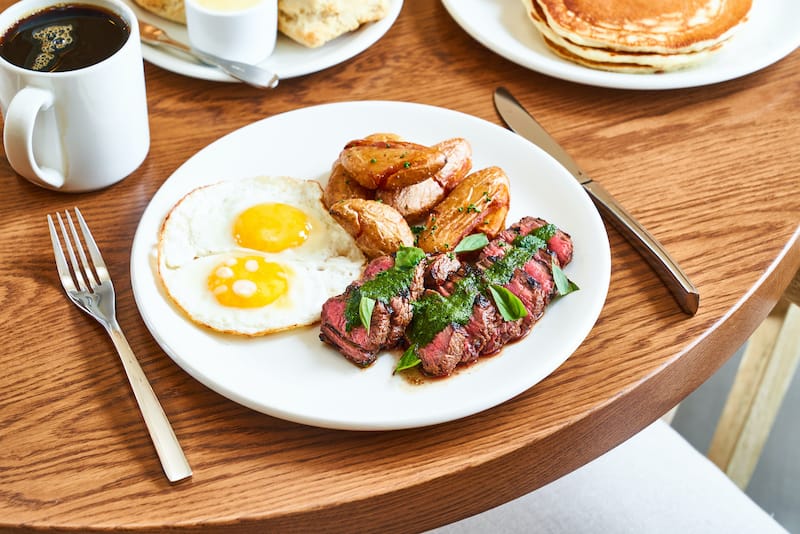 Asian-marinated flank steak and eggs comes highly recommended by staff at The Peach. Photo ⓒ Erin Ng.