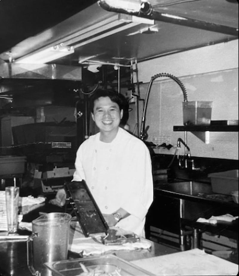 Charles Phan in his early years as a chef. Photo via the Slanted Door website.