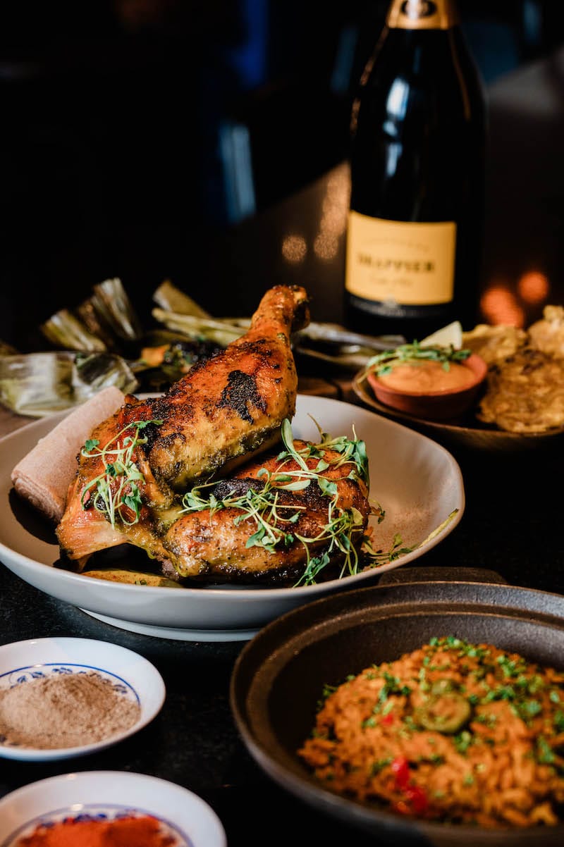 Doro doro pollo, served with injera, blends Dominican and Ethiopian staples at MESKI. Photo: ⓒ Megan Latify.