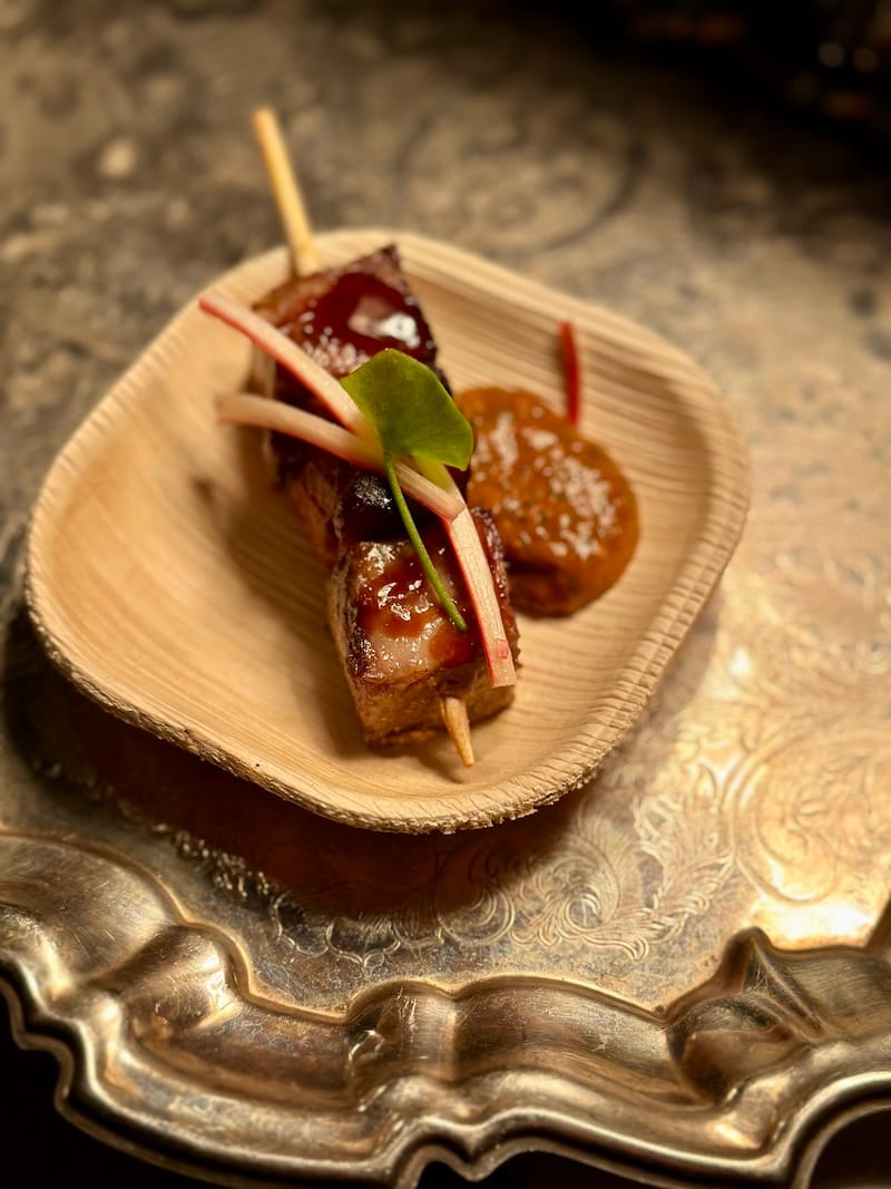 A phenomenal bite from Dalida at James Beard Foundation Taste America: Snake River Farms Berkshire pork souvlaki (pork collar with Presidio rhubarb tkemali and Shasta County porcini). Photo: © tablehopper.com.