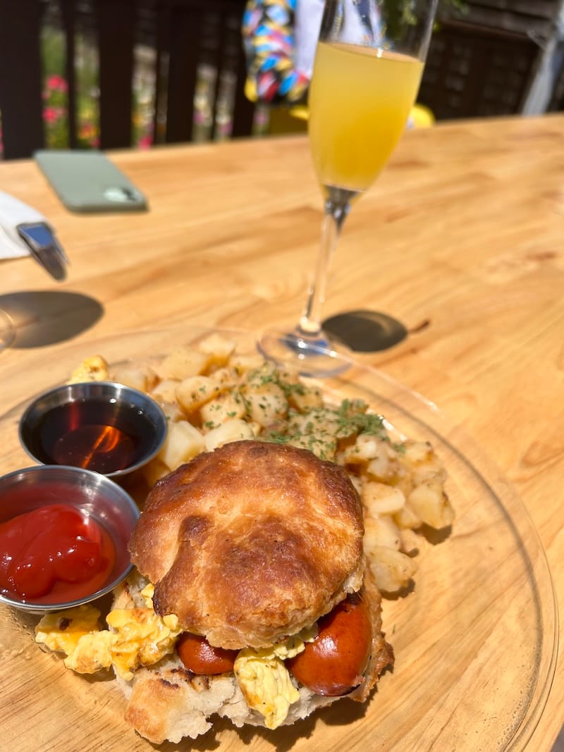 One of Smoke Soul Kitchen’s biscuit sandwiches, filled with hot links and eggs. Photo courtesy of Smoke Soul Kitchen.