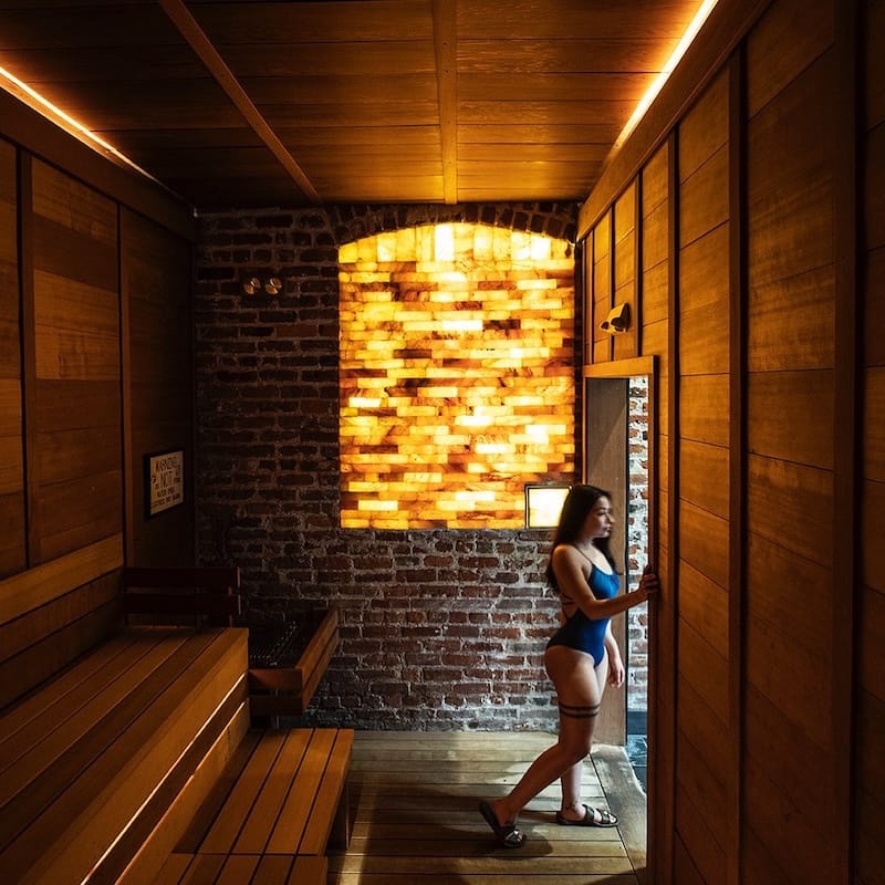 The glowing salt brick window in the dry sauna. Photo courtesy of Onsen.